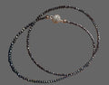 Collier petites perles noires brillantes neuf