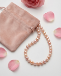 Collier en perles roses authentique - neuf