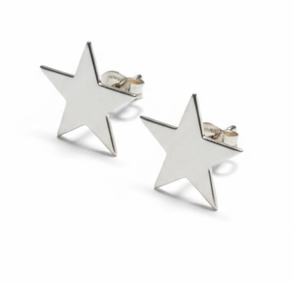 Boucles d’oreilles étoiles argentées comme neuves