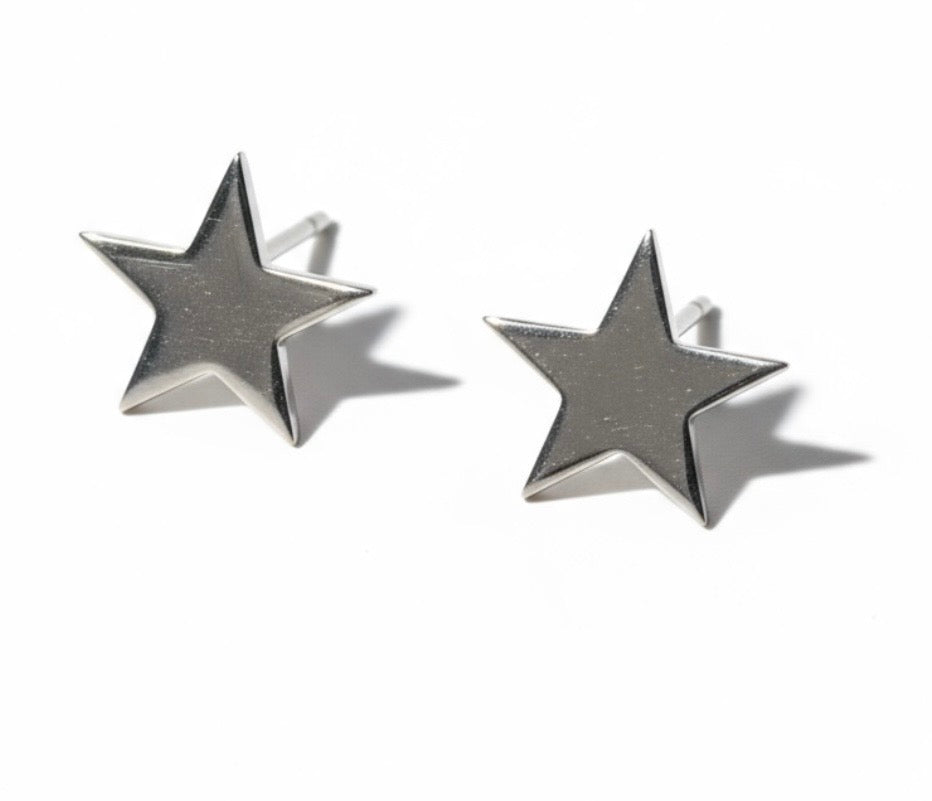 Boucles d’oreilles étoiles argentées comme neuves