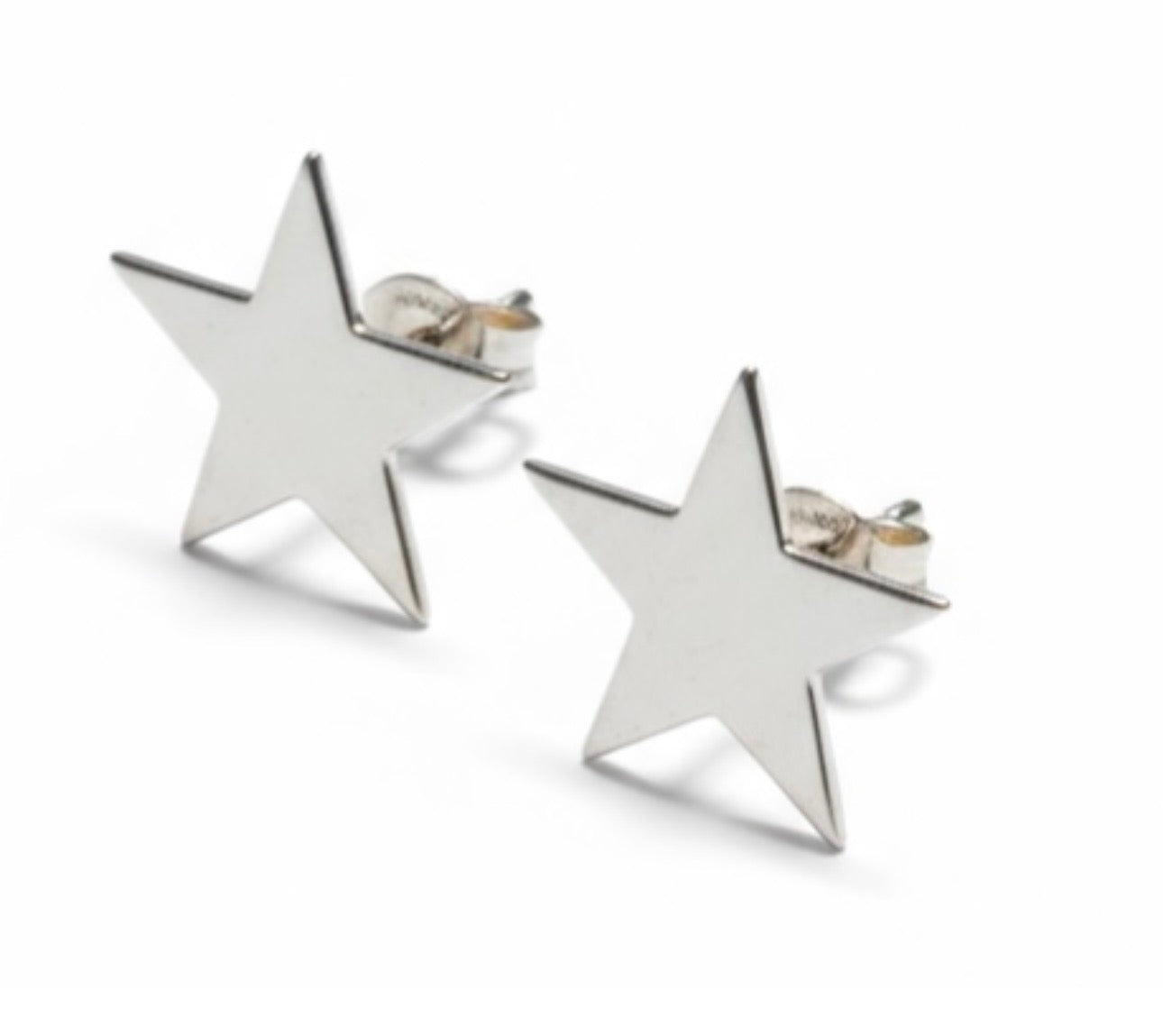 Boucles d’oreilles étoiles argentées comme neuves